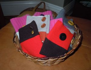 Wrist wallets made from upcycled sweater cuffs